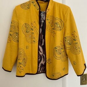 Beautiful silk land jacket with sequin embellishments. New with tags.